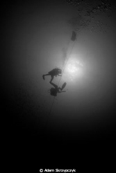 Divers on the way up from the Alma Jane. by Adam Skrzypczyk 